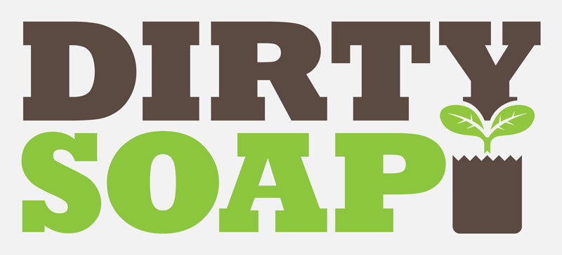 Graphic design with words "Dirty Soap" in brown and green lettering with a potted plant graphic forming the letter "i", highlighting Dirty Soap bar soaps available at retail locations.