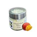 A 3.0 oz (89 ml) glass jar of Dirty Soap Mango Whipped Body Butter, shown with whole and sliced mangoes in front—ideal for tropical skincare lovers.