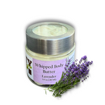 A 3.0 oz (89 ml) jar of Dirty Soap Bubbles Lavender Whipped Body Butter is pictured with fresh lavender, showcasing this calming organic body moisturizer.