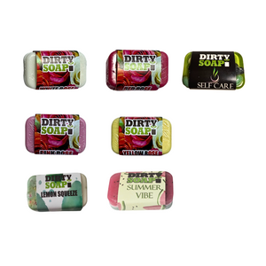 Seven Dirty Soap Mini Bars by Dirty Soap, each with a unique label and color, are arranged in two rows on a white background—perfect natural ingredient soap samples.