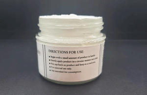 A jar of Mango Whipped Body Butter with application instructions on the label by Dirty Soap.