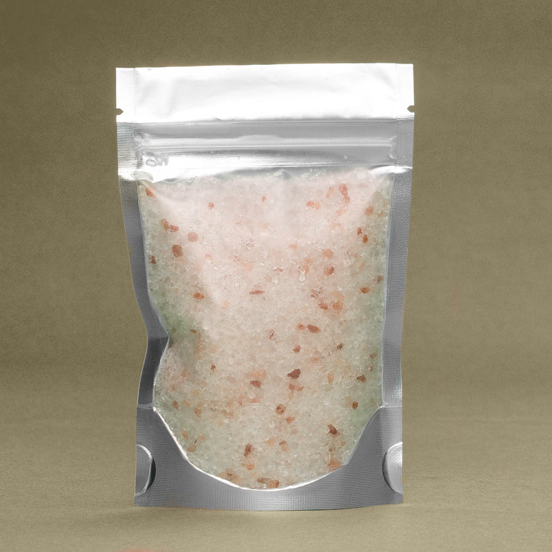 Sealed pouch containing Sunrise Grapefruit & Himalyan Salt Bath Salts by Dirty Soap.