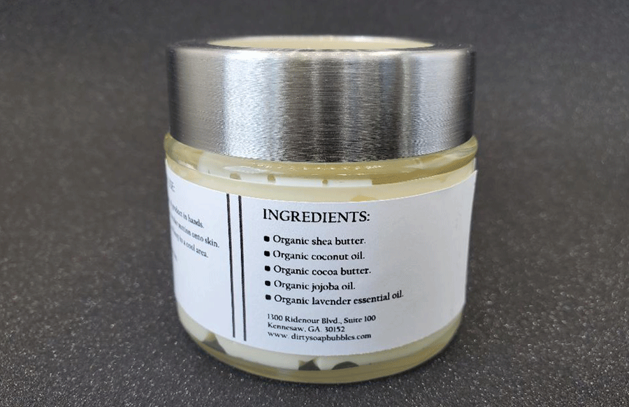 A jar of Lavender Whipped Body Butter with a Dirty Soap Bubbles ingredient label.