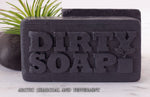 Arctic Charcoal & Peppermint with Goat's Milk bar soap, from the brand Dirty Soap, is engraved with the words "dirty soap" in capital letters.